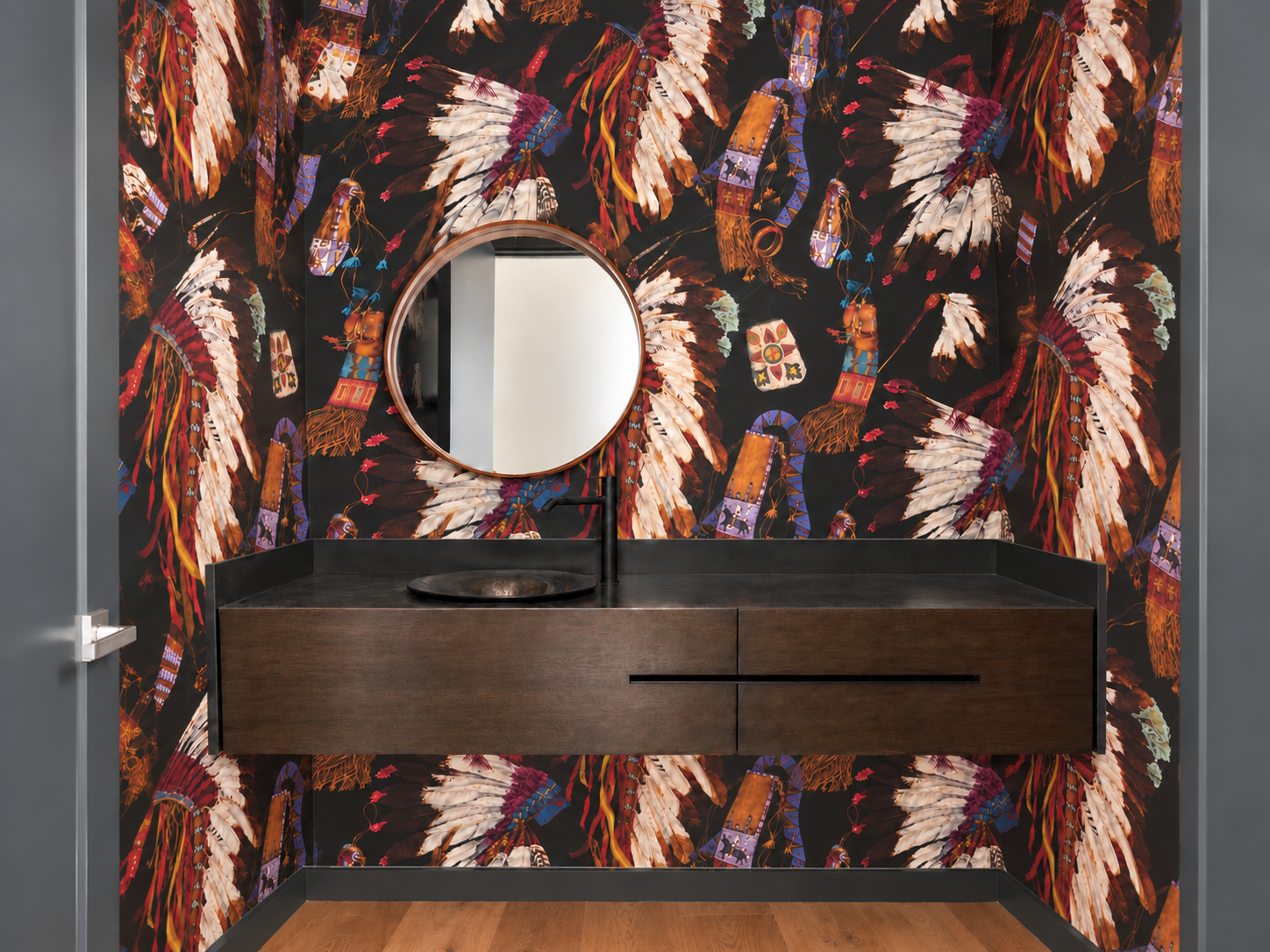 Sculptural dark wood floating vanity with black stone top
