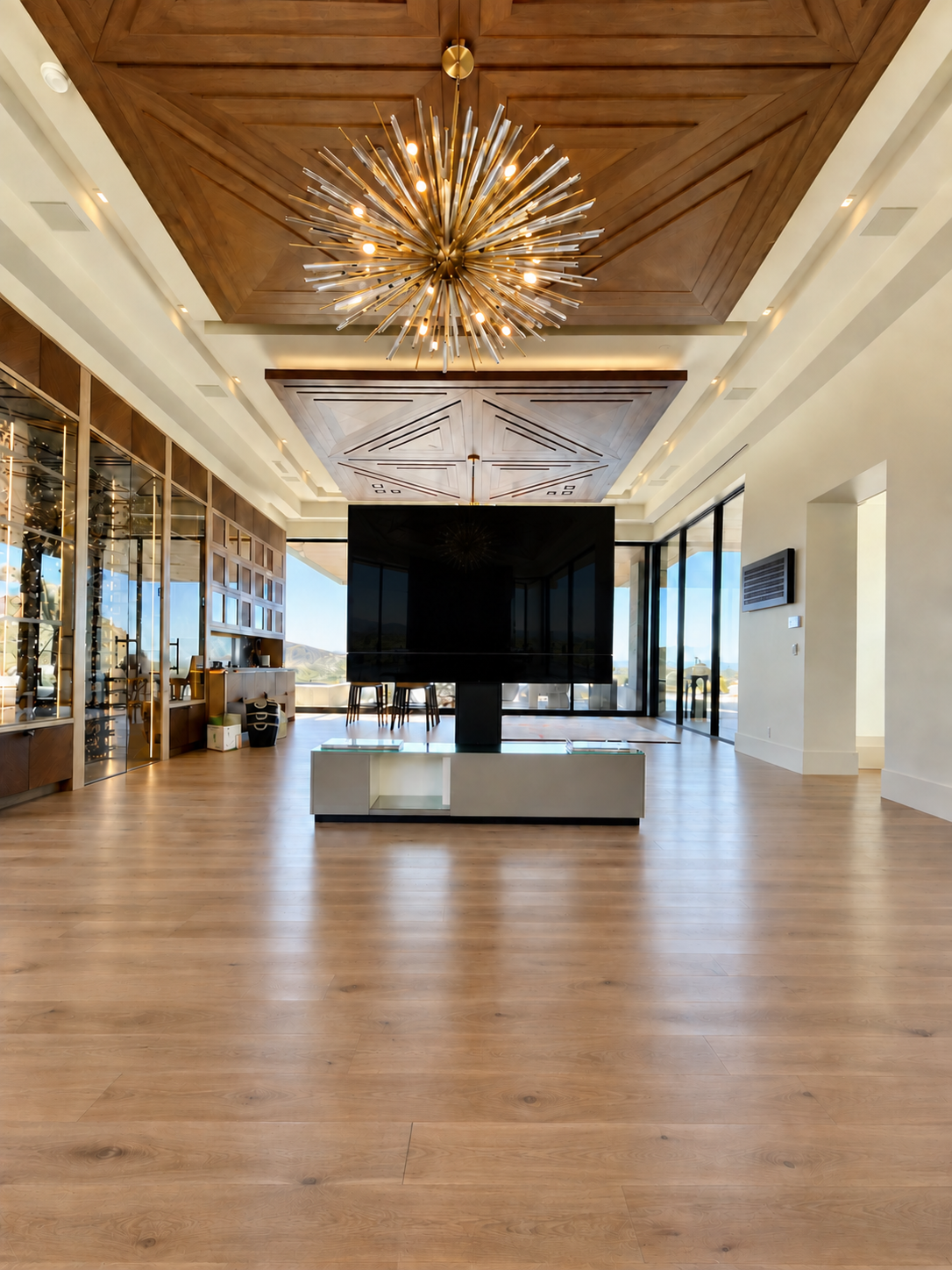 Full-room view of the custom dual TV console by Burkee Designs