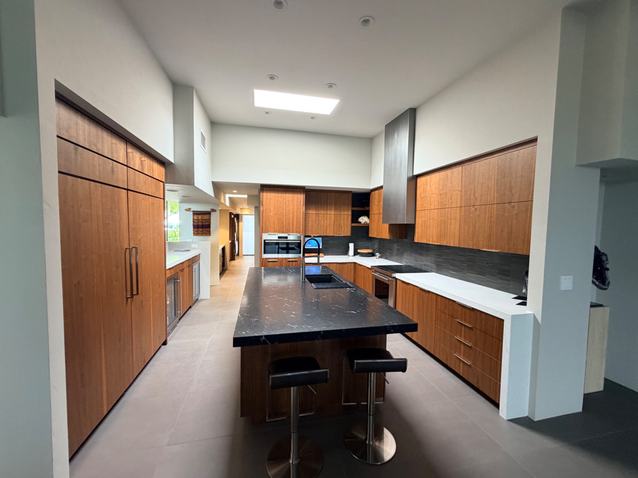 Custom walnut kitchen cabinetry by Burkee Designs