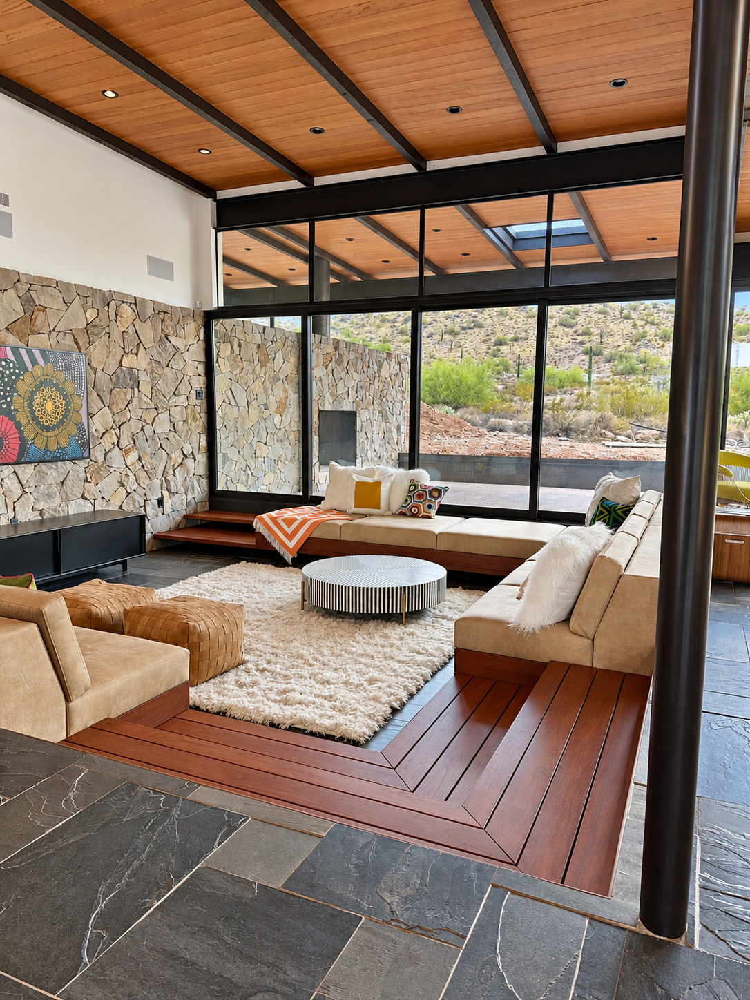 Sunken living room with custom sculptural furnishings